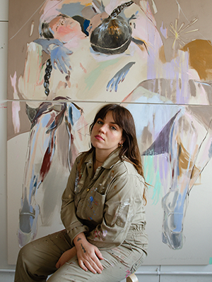 In a scene reminiscent of an artist's sanctuary, a figure clad in a paint-splattered jumpsuit sits contemplatively before an abstract painting of a horse. The artwork, evoking the style of Marcelina Amelia, is crafted in muted tones that stir the imagination and beckon quiet reflection.