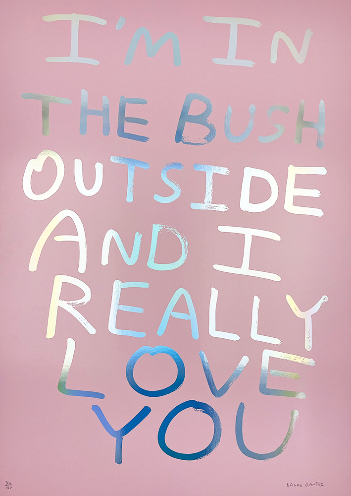 The artwork presents a serene pastel pink canvas as its backdrop, overlaid with bold text that reads, "I'M IN THE BUSH OUTSIDE AND I REALLY LOVE YOU." The lettering is eye-catching and vibrant, transforming with iridescent hues through holographic effects. This piece, known as the "I'm in the bush outside - Holographic (Pink edition)," is an imaginative blend of color and message that evokes both whimsy and heartfelt sentiment.