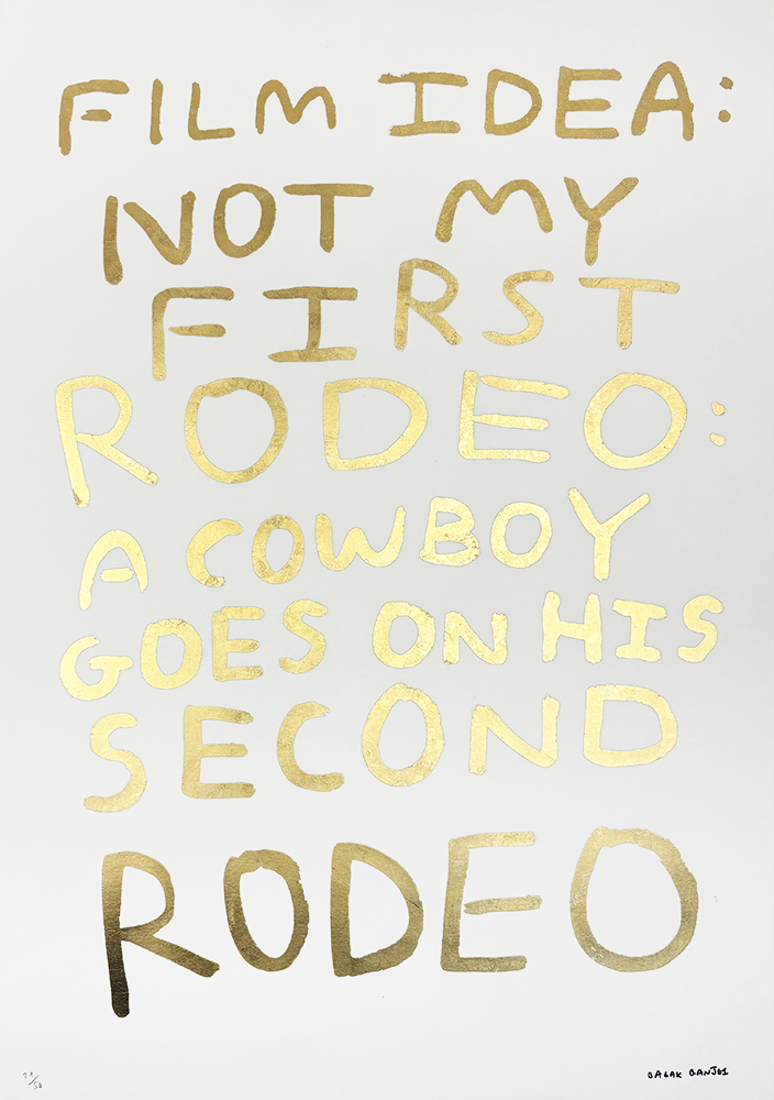 In this artistic depiction, the phrase "FILM IDEA: NOT MY FIRST RODEO" is elegantly rendered in opulent gold leaf against a pristine white canvas. This artwork captures the essence of a narrative centered around a cowboy preparing for his sophomore adventure at the rodeo arena. The luxurious text invites viewers into a world where experience meets anticipation, hinting at the unfolding journey of skill and resilience on display.