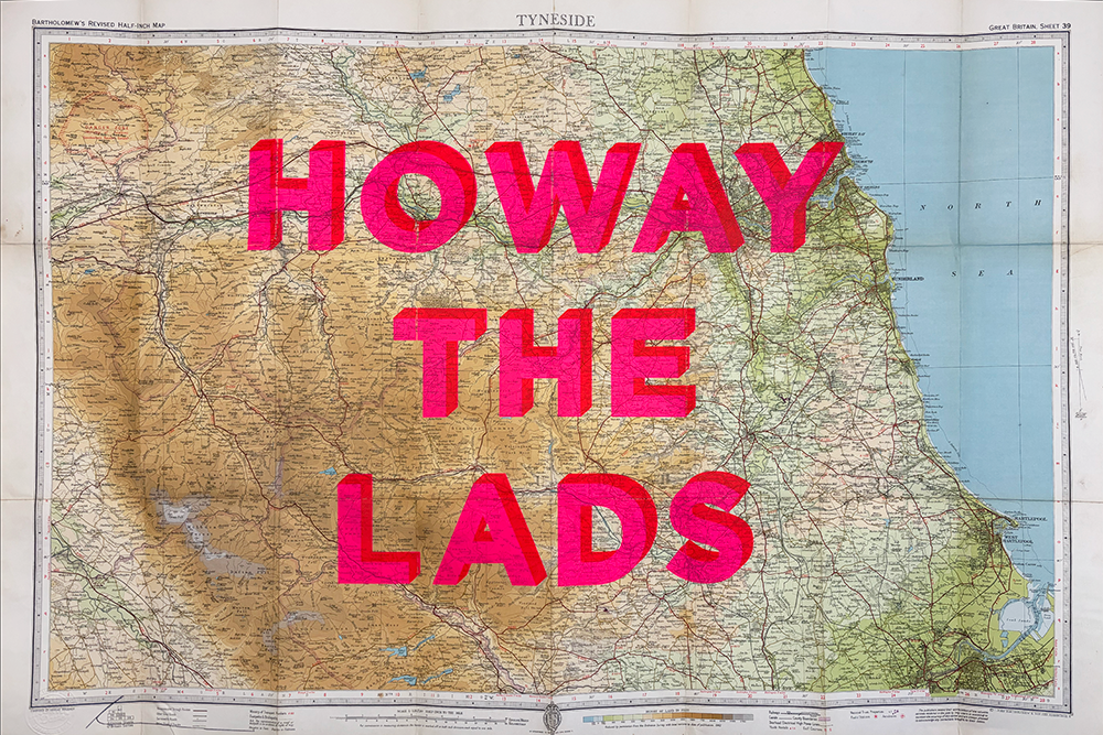 This artwork features a vintage map of Tyneside, meticulously detailed and measuring 560 x 590 mm. Overlaid on this intricate cartographic depiction is the bold red lettering proclaiming "HOWAY THE LADS," creating a striking contrast against the geographic intricacies. The composition is elegantly framed with a refined white margin, enhancing its presentation as both a historical piece and an artistic statement.