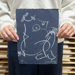 small blue paper held