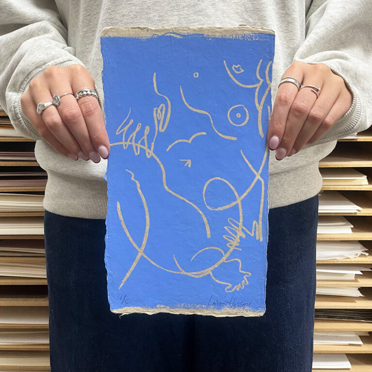 small light blue lax held