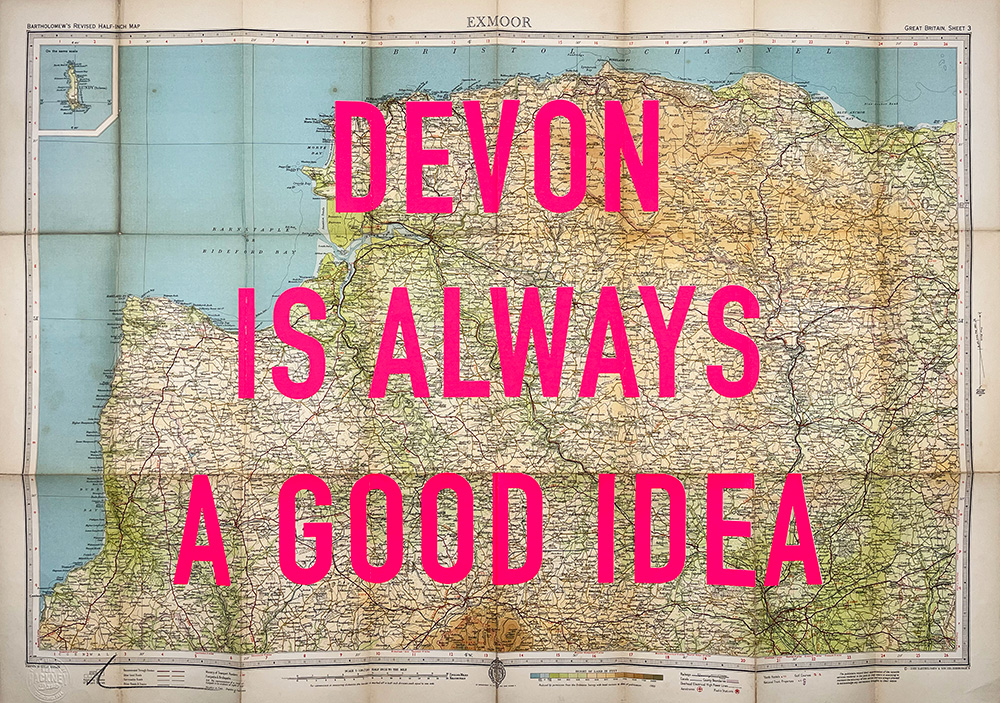 A map of Devon, England, with the words "DEVON IS ALWAYS A GOOD IDEA" in large pink capital letters overlaid on top.