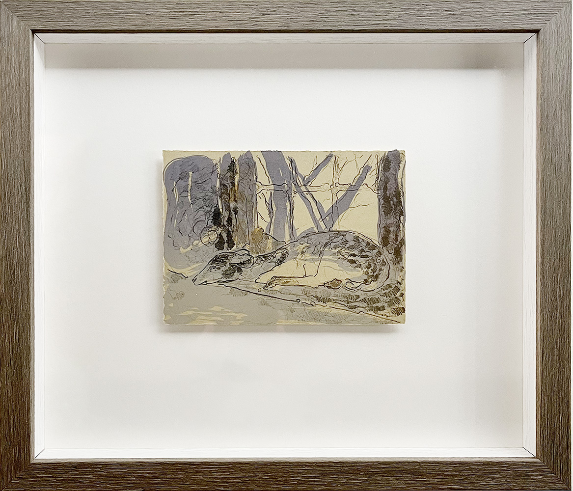 A small, framed Curly Cat - Stone Lithograph depicts a curled cat resting among trees, featuring gentle forms and a muted, earthy colour palette.