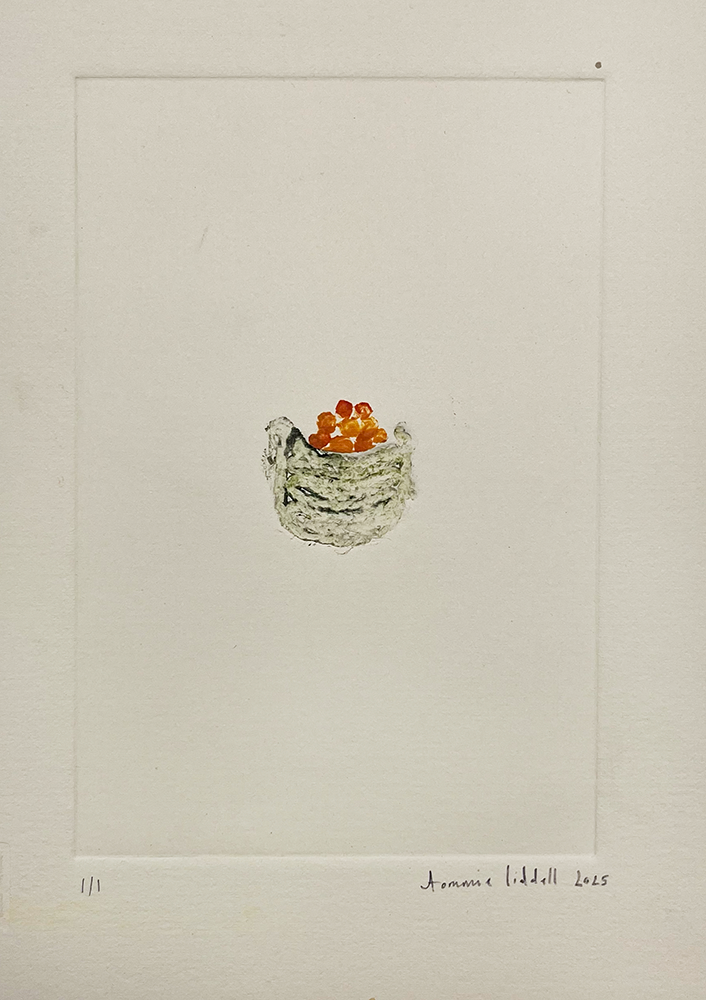A small, textured nest inspired by the Orange Basket - Original Mono Type sits centered on white paper, cradling several vibrant orange eggs. Signed "Aramis Liddell 2025" at the lower right.