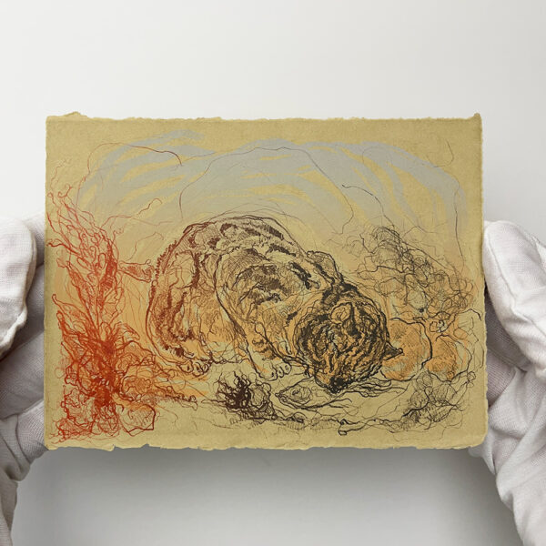 A person wearing white gloves holds a small textured paper with a detailed drawing of a crouching tiger surrounded by abstract lines.