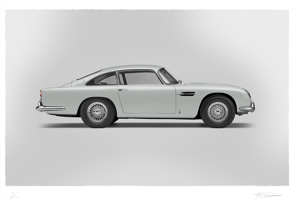 Side view of a classic silver Aston Martin coupe car on a plain grey background.