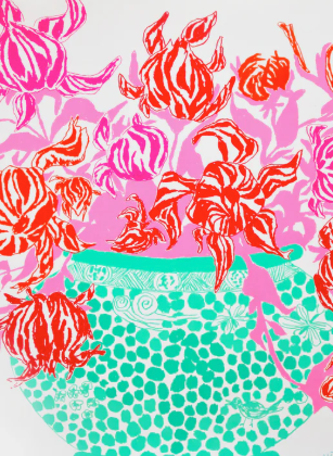 A decorative teal and white vase with green spots holds red, pink, and orange abstract flowers against a white background.