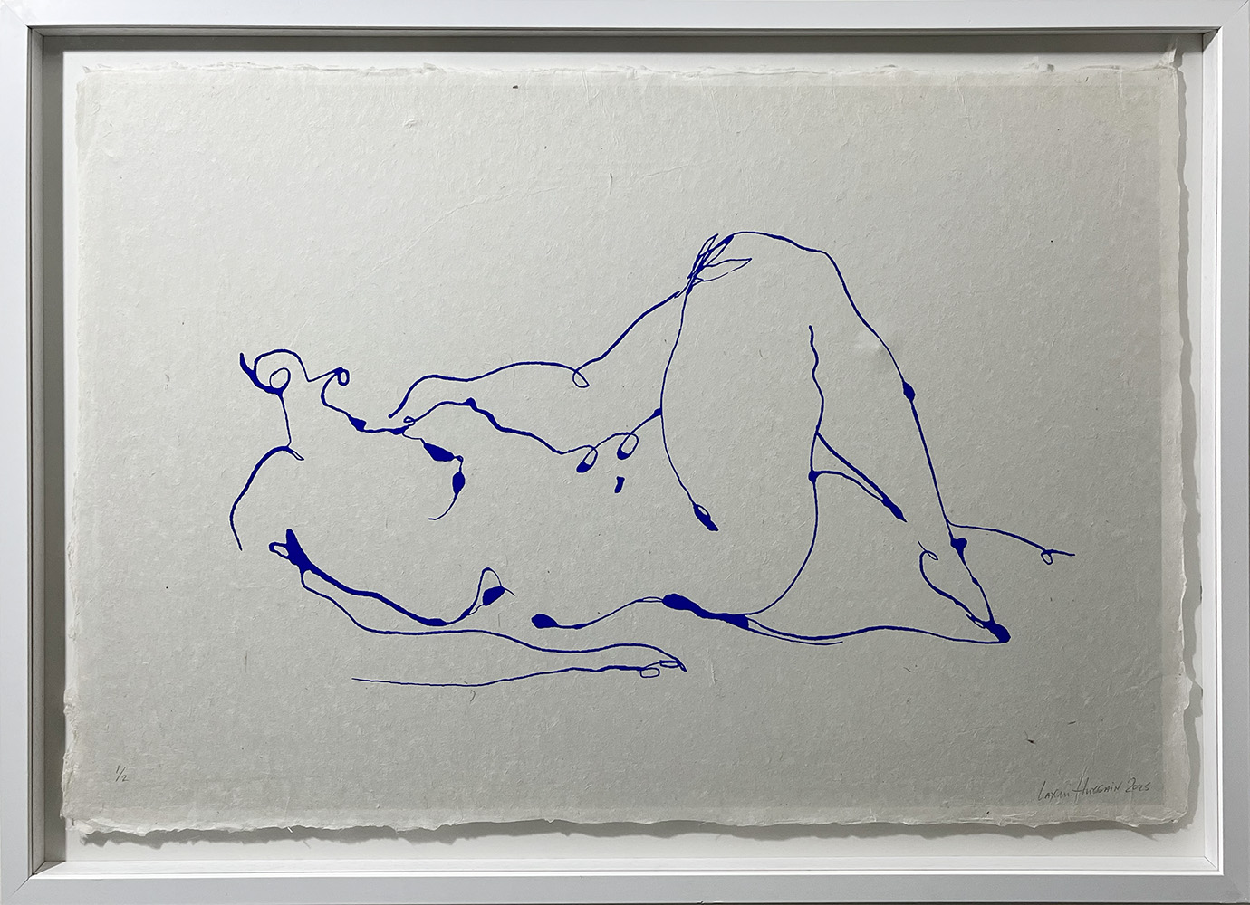 Reclining Nude, Off White - Limited Edition features a minimalist blue line drawing of a reclining nude on textured off-white paper, centred in a simple white frame. Available as a limited edition piece.