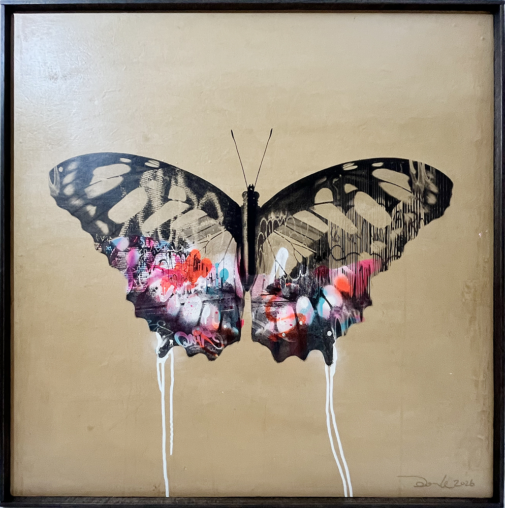 A butterfly with detailed black wings features colourful graffiti patterns and white paint drips on a plain tan background.