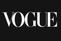 The Vogue logo in white capital letters on a black background.