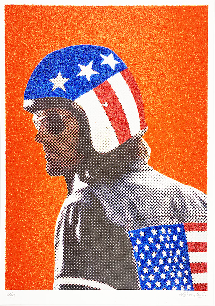 A person in profile wears a Captain America helmet and jacket with stars and stripes, set against a bright orange background.